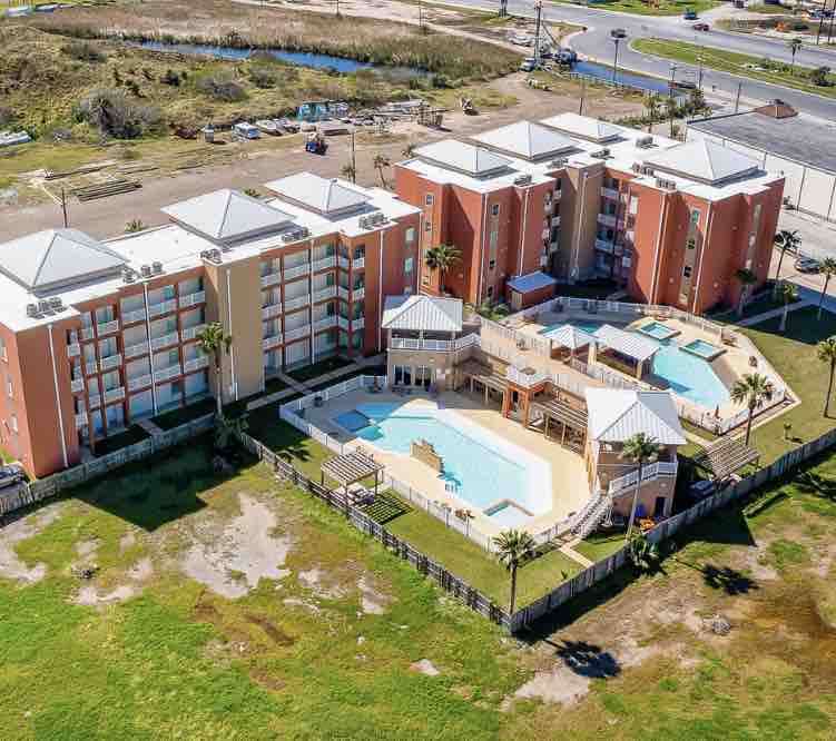 Aerial view of the La Isla community and pool